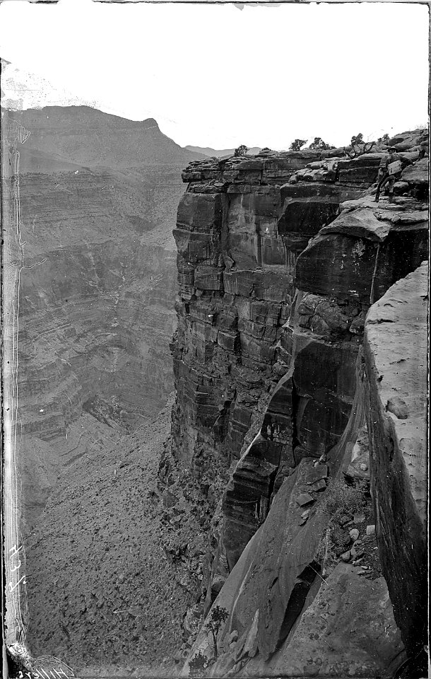 Grand Canyon. Note- Man with map case on his back is standing on top cliff in upper right corner of - NARA - 517800
