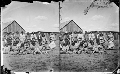 Group of Coyotero Apache and their agent at Camp Apache Arizona, 1873 - NARA - 519790