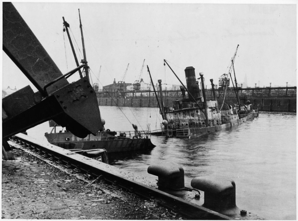 Hamburg, Germany. After the 1943 air raids, the port of Hamburg was strewn with sunken ships, like this Norwegian... - NARA - 541695