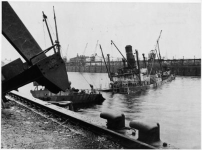 Hamburg, Germany. After the 1943 air raids, the port of Hamburg was strewn with sunken ships, like this Norwegian... - NARA - 541695