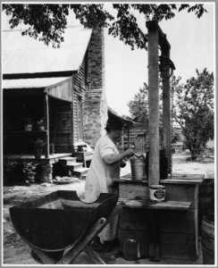 Harmony Community, Putnam County, Georgia. This well belongs to the community's one Negro owner. His . . . - NARA - 521262 photo