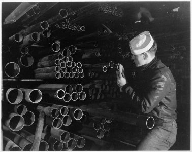 Group 4. Checking pipe. England, circa 1944 - NARA - 540068