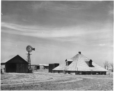 Haskell County, Kansas. A good example of the semi-subterranean houses that are found all over this . . . - NARA - 522087 photo