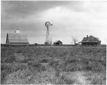 Haskell County, Kansas. A view of another very run-down farm. The interesting thing here is that it . . . - NARA - 522081 photo