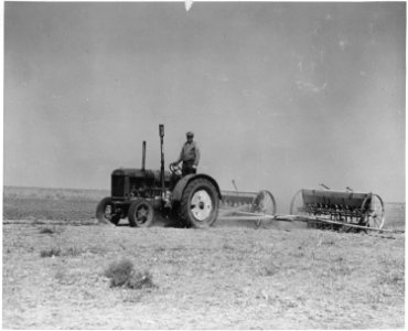 Haskell County, Kansas. Some of the land is planted to small grains (often barley) and sorghums are . . . - NARA - 522097 photo