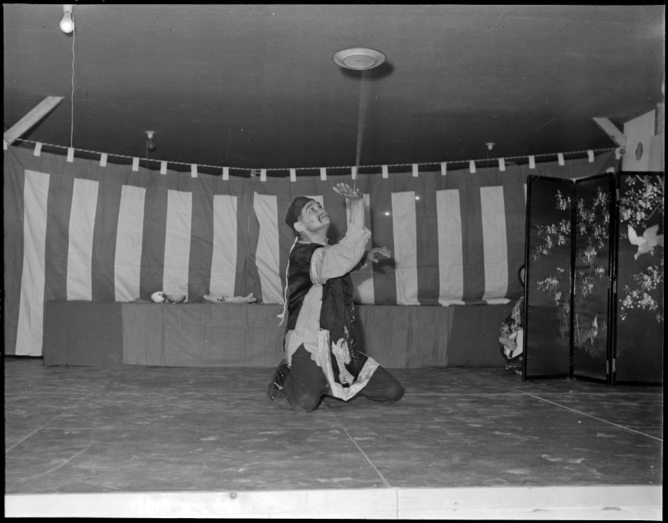 Heart Mountain Relocation Center, Heart Mountain, Wyoming. A member of one of the entertainment gro . . . - NARA - 538758