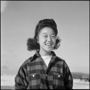 Heart Mountain Relocation Center, Heart Mountain, Wyoming. A typical young high school girl at the . . . - NARA - 539181