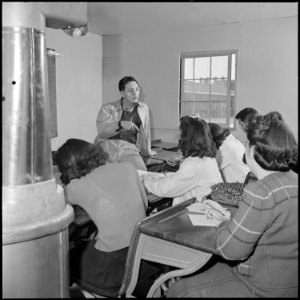 Heart Mountain Relocation Center, Heart Mountain, Wyoming. Bill Hosokawa, Editor of the Sentinel, H . . . - NARA - 539213
