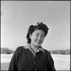 Heart Mountain Relocation Center, Heart Mountain, Wyoming. A young Nisei girl, Alice Hifumi, 17. A . . . - NARA - 539192