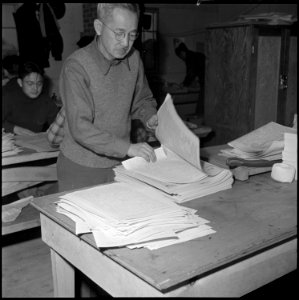 Heart Mountain Relocation Center, Heart Mountain, Wyoming. A member of the staff of the Japanese la . . . - NARA - 539202