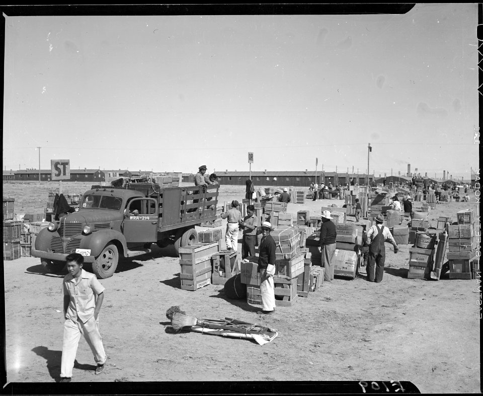 Heart Mountain Relocation Center, Heart Mountain, Wyoming. As carloads of personal belongings arriv . . . - NARA - 538772