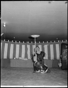 Heart Mountain Relocation Center, Heart Mountain, Wyoming. During an evening program, an evacuee en . . . - NARA - 538778