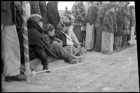 Heart Mountain Relocation Center, Heart Mountain, Wyoming. Football fans of Heart Mountain braved s . . . - NARA - 539461