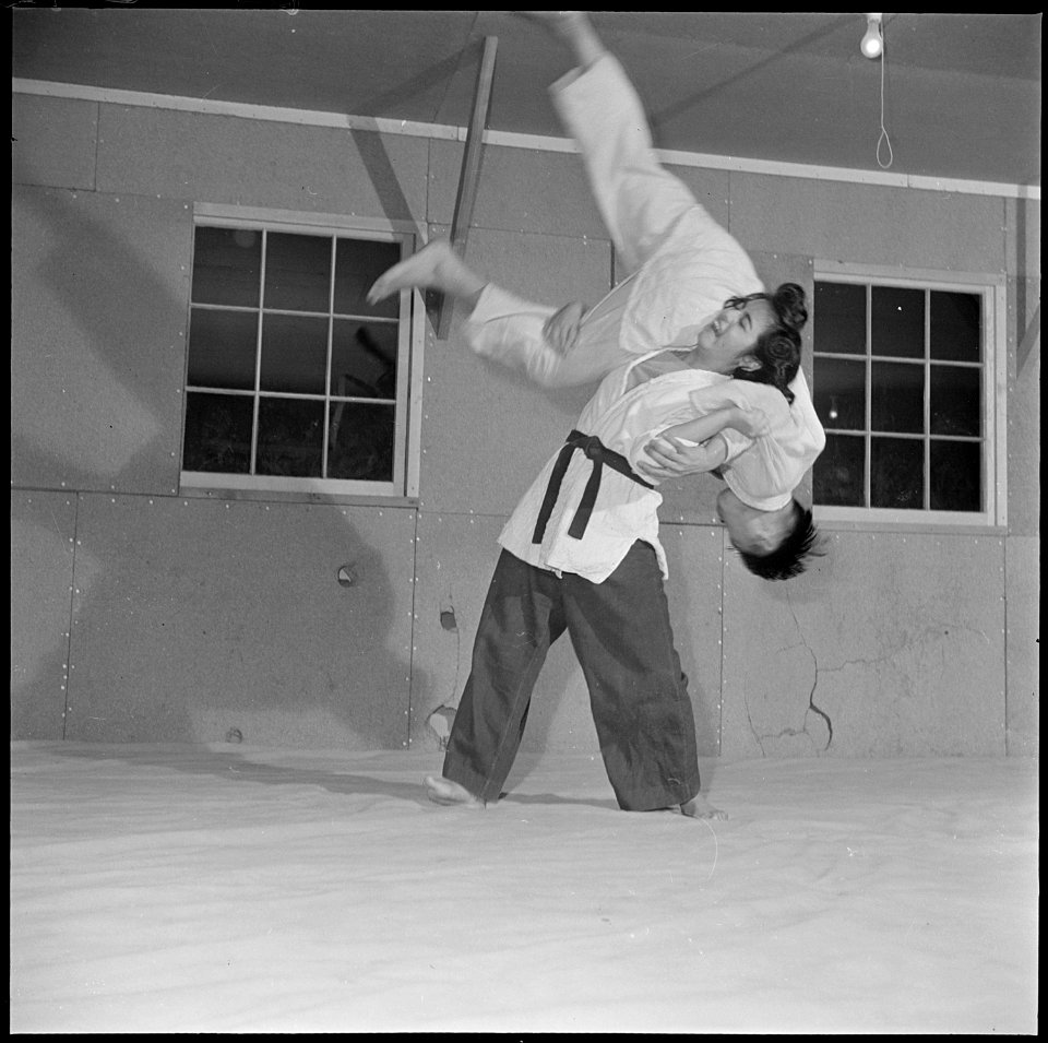 Heart Mountain Relocation Center, Heart Mountain, Wyoming. In a class for girls, an advanced girl s . . . - NARA - 539173