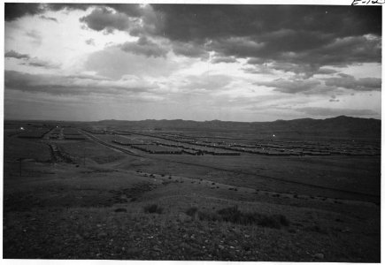 Heart Mountain Relocation Center, Heart Mountain, Wyoming. Looking east over the relocation center . . . - NARA - 538791
