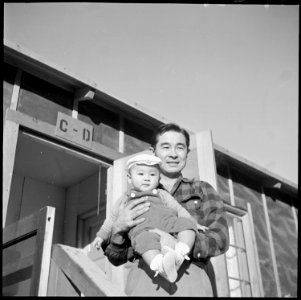Heart Mountain Relocation Center, Heart Mountain, Wyoming. Paul Nakadati and his son Paul, Jr., bet . . . - NARA - 539270