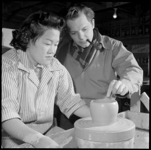 Heart Mountain Relocation Center, Heart Mountain, Wyoming. Minnie Negoro, an art student at the Uni . . . - NARA - 539261