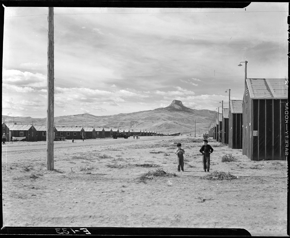 Heart Mountain Relocation Center, Heart Mountain, Wyoming. Looking west on F street, main thoroug . . . - NARA - 538789