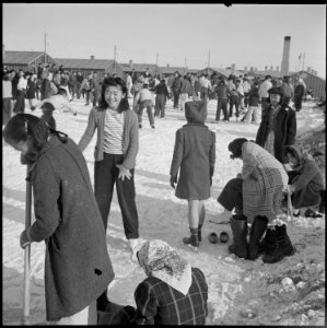 Heart Mountain Relocation Center, Heart Mountain, Wyoming. Residents of Japanese ancestry, at the H . . . - NARA - 539235