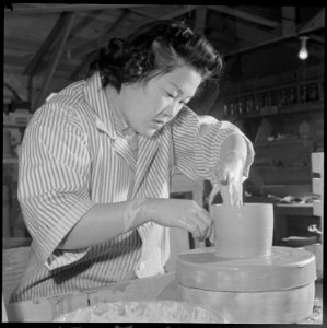 Heart Mountain Relocation Center, Heart Mountain, Wyoming. Minnie Negoro, an art student at the Uni . . . - NARA - 539262
