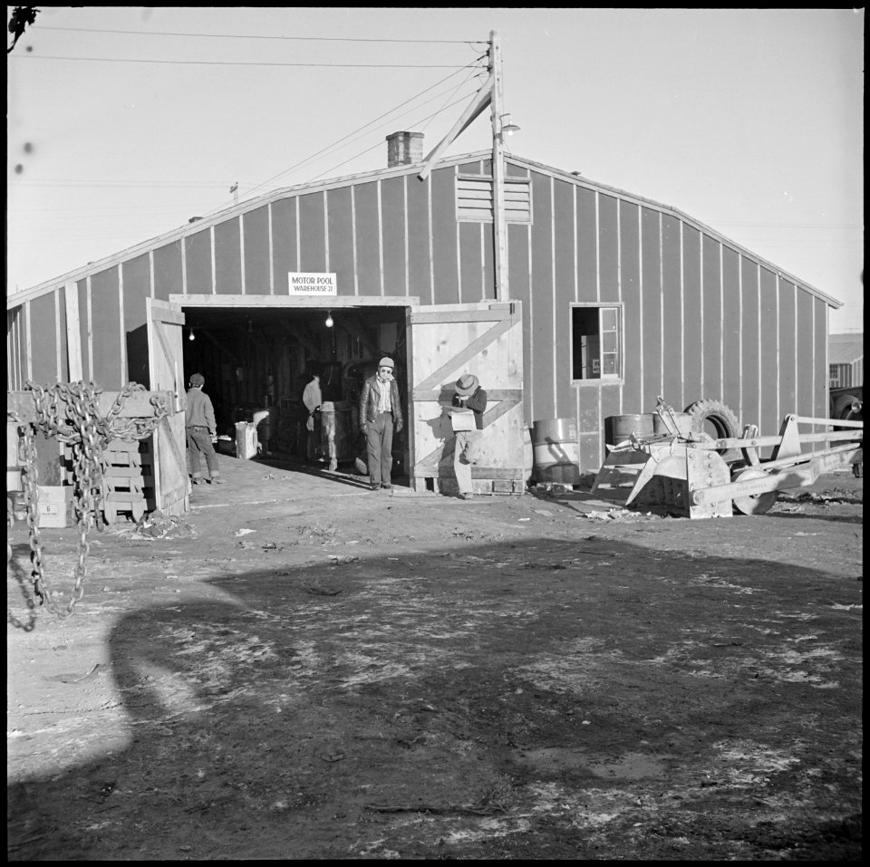 Heart Mountain Relocation Center, Heart Mountain, Wyoming. The motor pool garage where all motor eq . . . - NARA - 539204