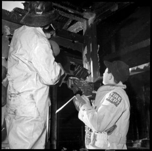 Heart Mountain Relocation Center, Heart Mountain, Wyoming. Temporary structures built of tar paper, . . . - NARA - 539276