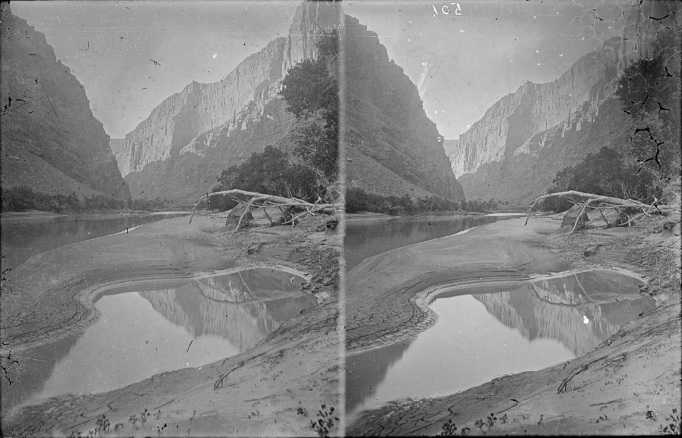 Heart of Lodore. Green River, similar to 4228 which shows Dellenbaugh seated on the bank and reflected in the water.... - NARA - 517838