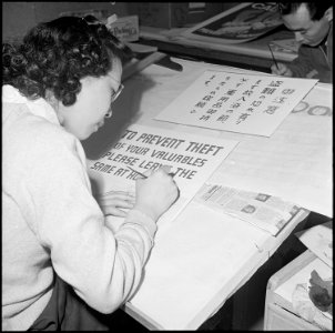 Heart Mountain Relocation Center, Heart Mountain, Wyoming. In the poster shop at the Heart Mountain . . . - NARA - 539147