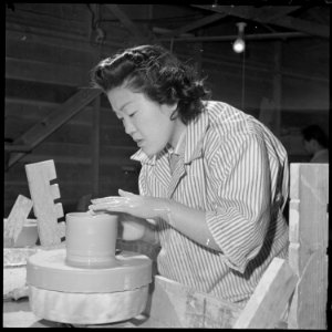 Heart Mountain Relocation Center, Heart Mountain, Wyoming. Minnie Negoro, an art student at the Uni . . . - NARA - 539263