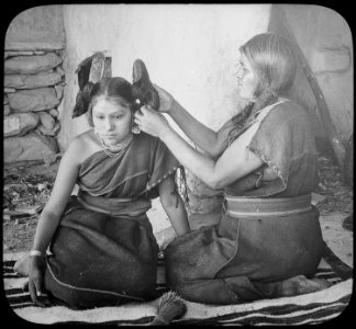 Hopi woman dressing hair of unmarried girl, 1900 - NARA - 520082 photo