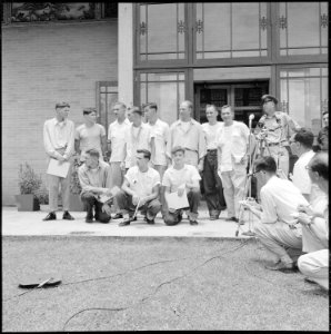 HQ. FEAF, TOKYO-Shown after their return to freedom in Hong Kong are eleven U.S. Air Force officers and airmen, crew... - NARA - 542290