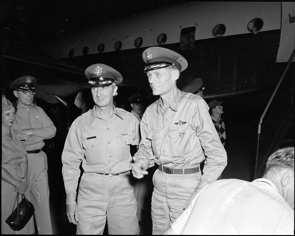 HQ. FEAF, TOKYO-Col. John K. Arnold Jr. (right), Montgomery, Ala., is escorted by Col. Herbert R. Volin, Tokyo Air... - NARA - 542291