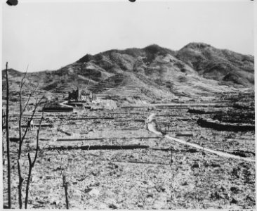 In the background, a Roman Catholic cathedral on a hill in Nagasaki, ca. 1945 - NARA - 519385 photo