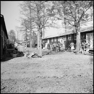 Jerome Relocation Center, Denson, Arkansas. A street scene on an uneventful afternoon in Block 7. - NARA - 538841