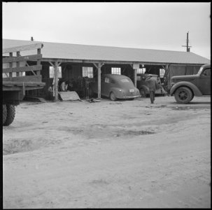 Jerome Relocation Center, Denson, Arkansas. An exterior view of the motor and truck shop at this re . . . - NARA - 538810