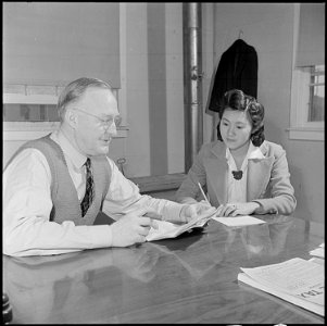 Jerome Relocation Center, Denson, Arkansas. Attorney Ulys A. Lovell, and his resident secretary, Mi . . - NARA - 539353