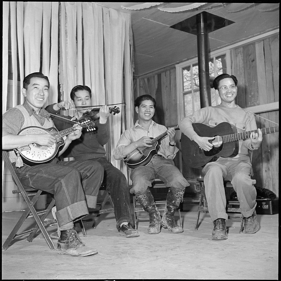 Jerome Relocation Center, Denson, Arkansas. Football crowd at game between group teams at this cent . . . - NARA - 539142