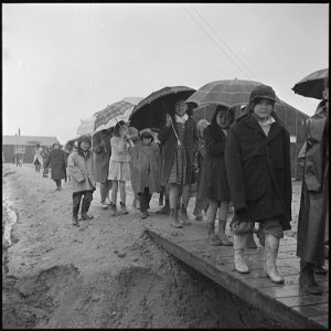Jerome Relocation Center, Denson, Arkansas. Grade school children leaving the school, at the Jerome . . . - NARA - 539350
