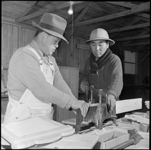 Jerome Relocation Center, Denson, Arkansas. In the cabinet shop, at the Jerome Relocation Center, w . . . - NARA - 539334