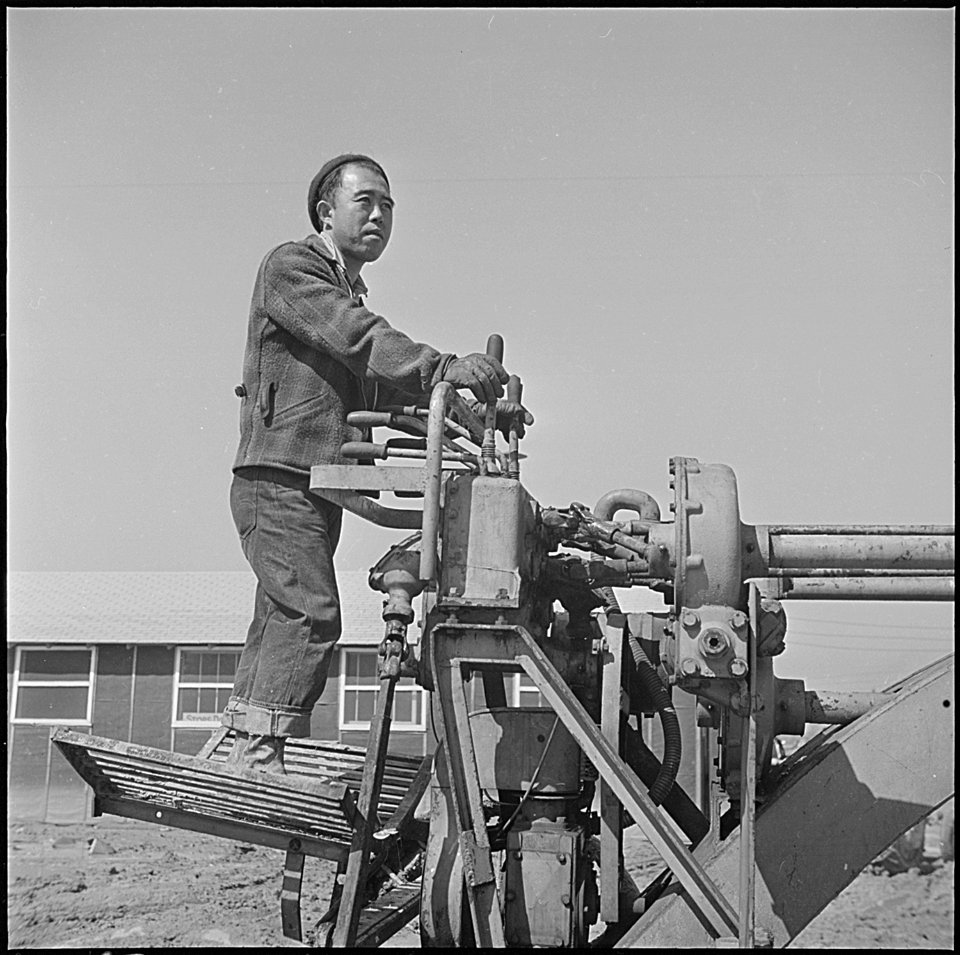Jerome Relocation Center, Denson, Arkansas. Maintaining center roadways, despite Arkansas rainy spr . . . - NARA - 539341