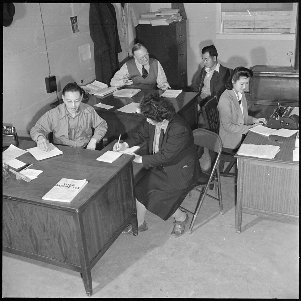 Jerome Relocation Center, Denson, Arkansas. Project Attorney, Lovell, a client and a part of his st . . . - NARA - 539356