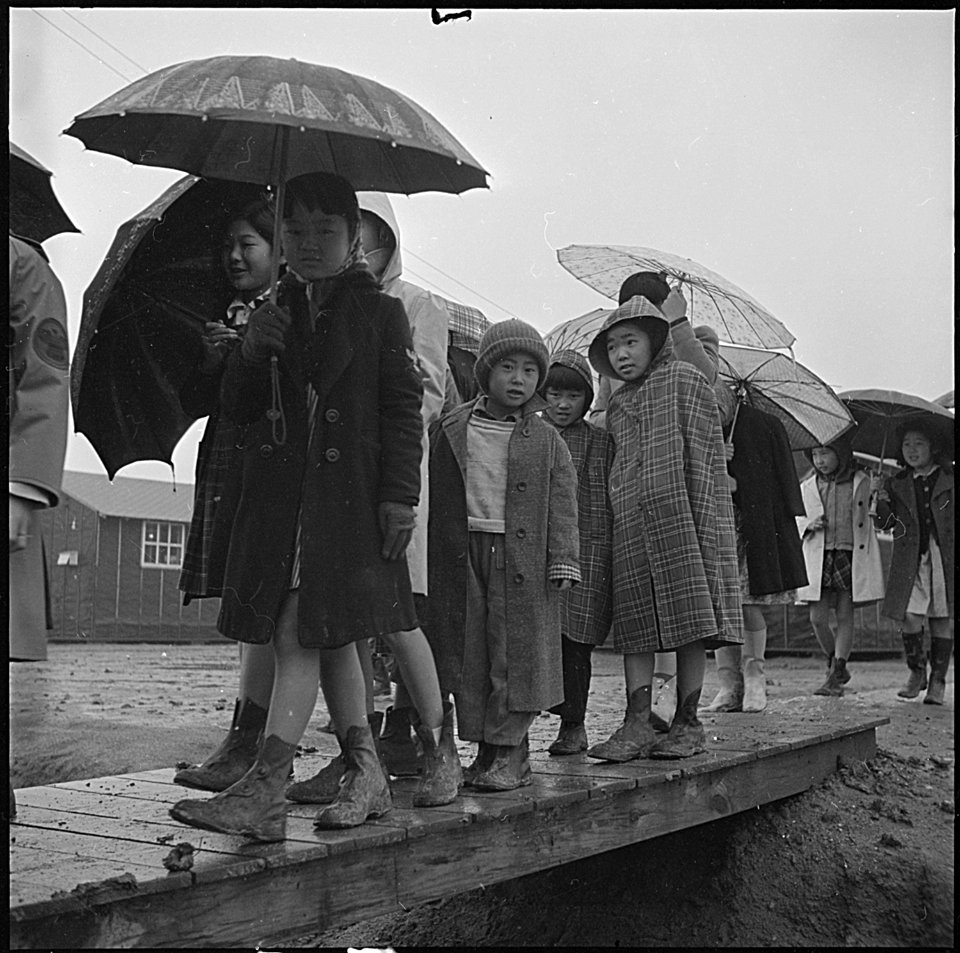 Jerome Relocation Center, Denson, Arkansas. School children leaving the grade school, at the Jerome . . . - NARA - 539346