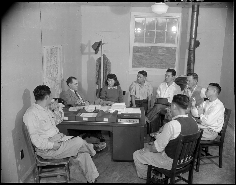 Jerome Relocation Center, Denson, Arkansas. Paul A. Taylor, Project Director, holding a meeting wit . . . - NARA - 538855
