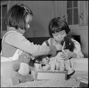 Jerome Relocation Center, Denson, Arkansas. Playing in the sand box at the Jerome Center pre-school . . . - NARA - 539327