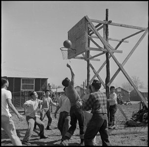 Jerome Relocation Center, Denson, Arkansas. On a sunny afternoon, at the Jerome Center, enthusiasti . . . - NARA - 539337