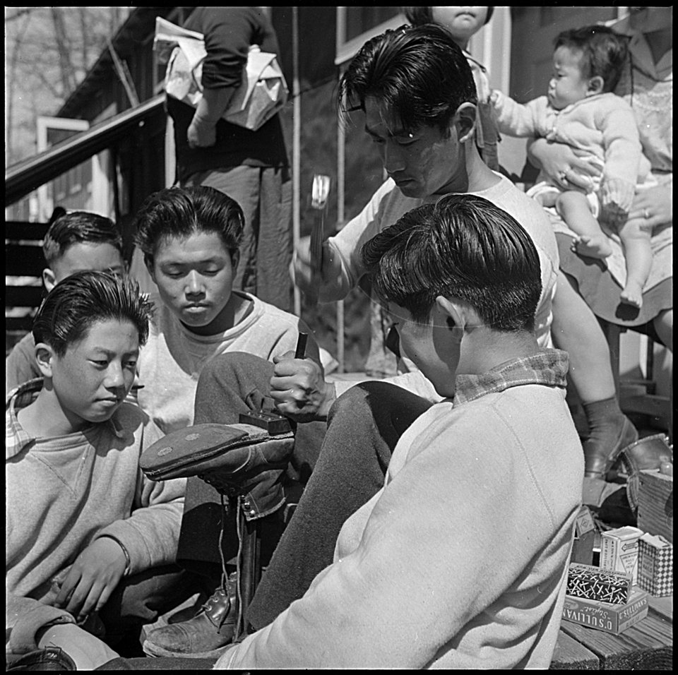 Jerome Relocation Center, Denson, Arkansas. On a sunny afternoon, the center resident who can repai . . . - NARA - 539336