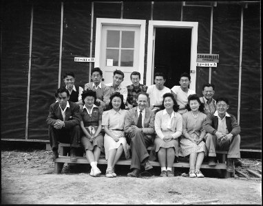 Jerome Relocation Center, Denson, Arkansas. The newspaper staff in a group, including (center) Char . . . - NARA - 538992