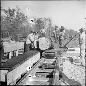 Jerome Relocation Center, Denson, Arkansas. Volunteer worker residents of the center operating a sa . . . - NARA - 538826