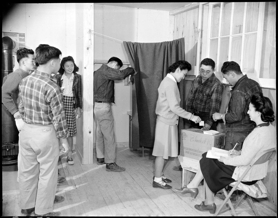 Jerome Relocation Center, Denson, Arkansas. Residents of Block 14 casting ballots to elect a block . . . - NARA - 538863