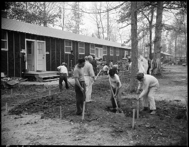 Jerome Relocation Center, Denson, Arkansas. A typical street scene in Block 30. - NARA - 538862